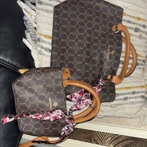 Nanette Lepore Brown Clutch with Monogram Design